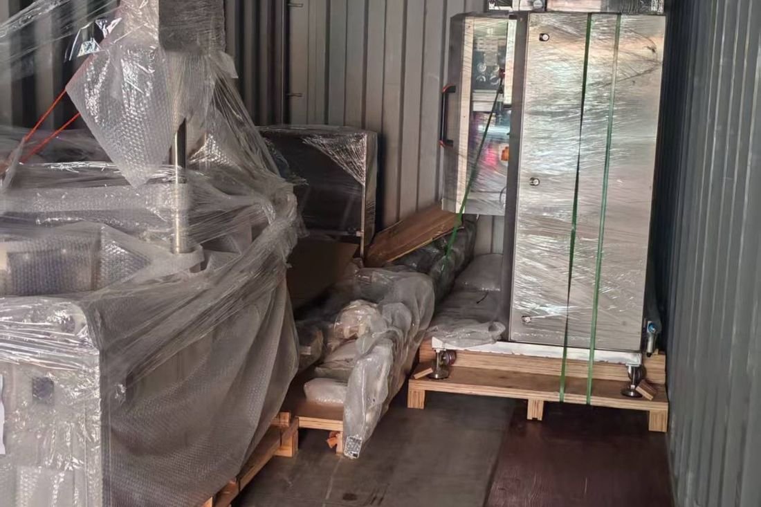 Oral-pouch line container-shipment photo