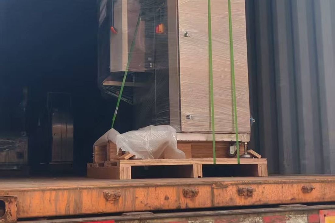 Oral-pouch line container-shipment photo