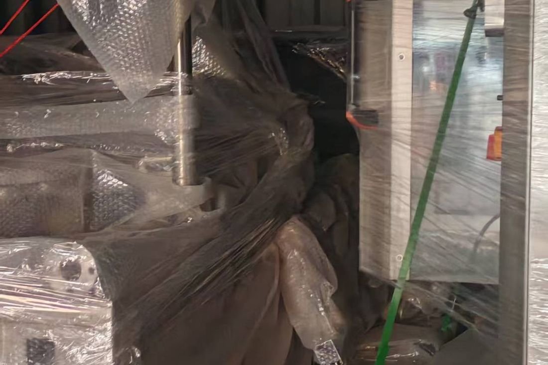 Oral-pouch line container-shipment photo