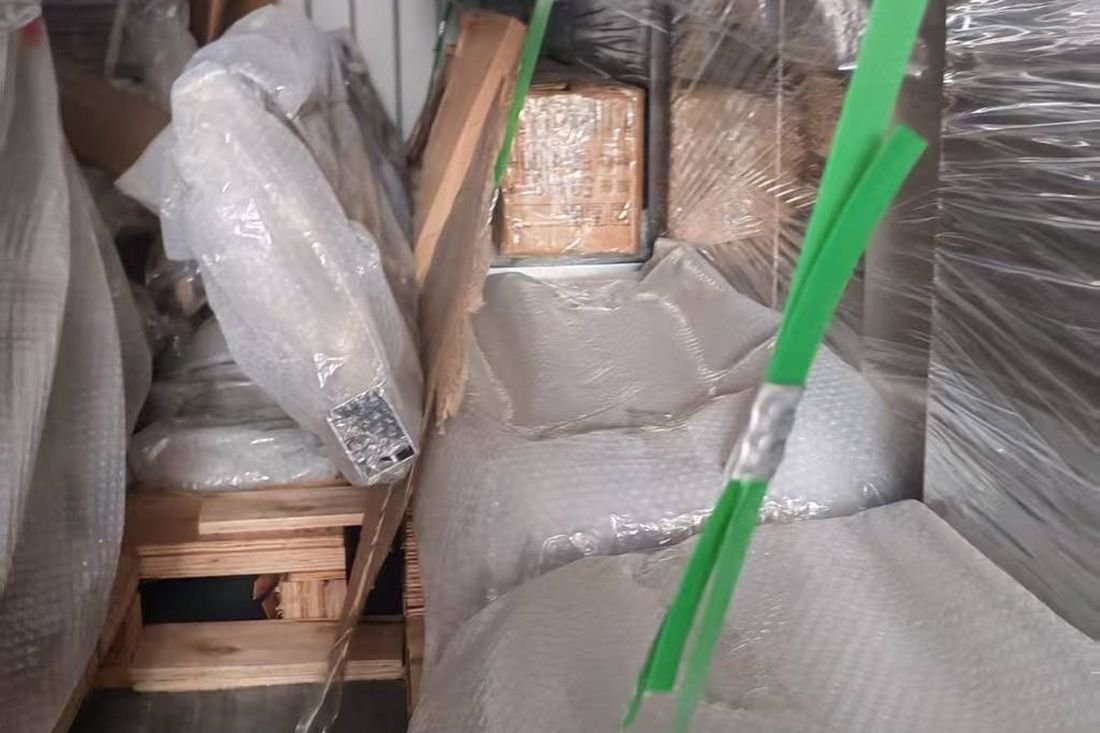 Oral-pouch line container-shipment photo