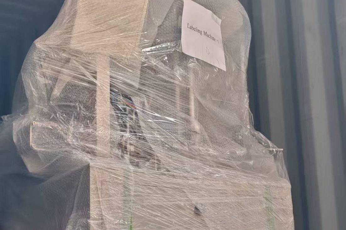 Oral-pouch line container-shipment photo
