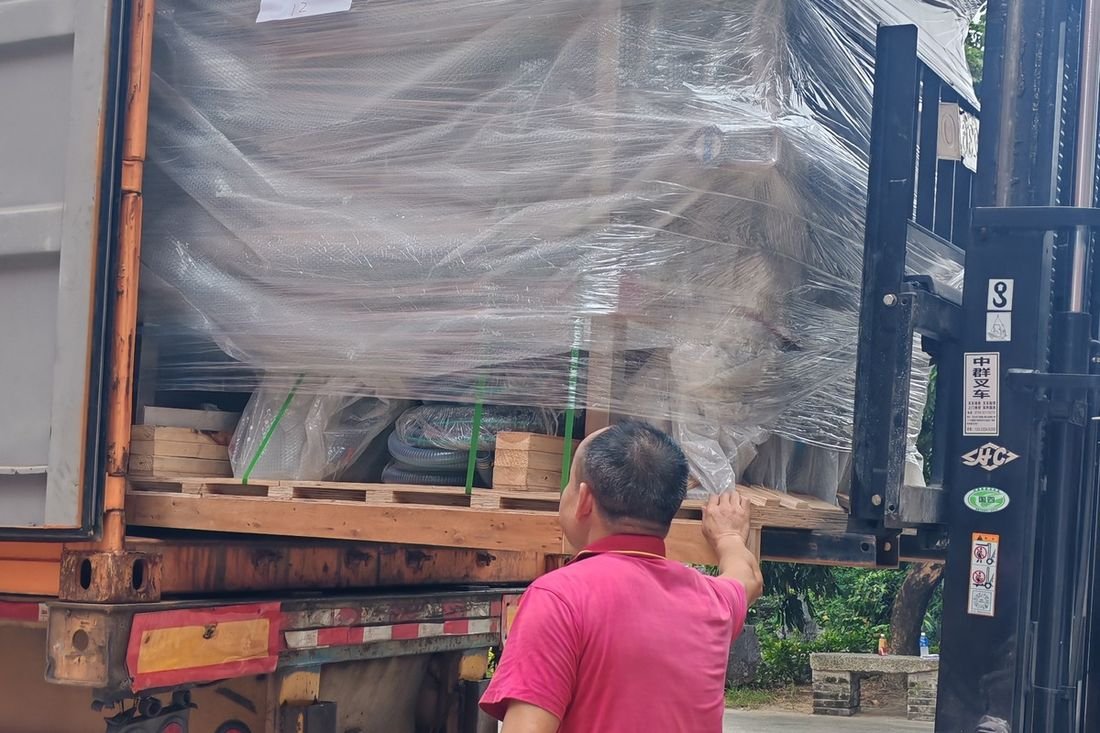 Oral-pouch line container-shipment photo