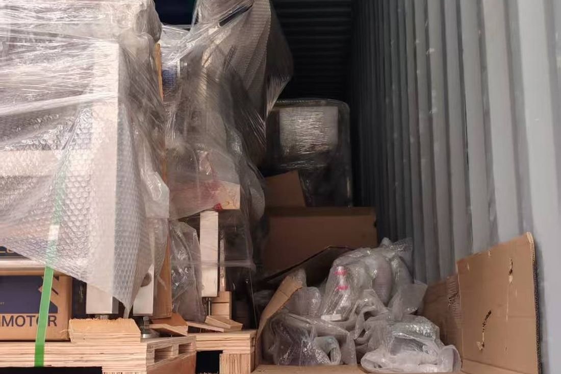Oral-pouch line container-shipment photo