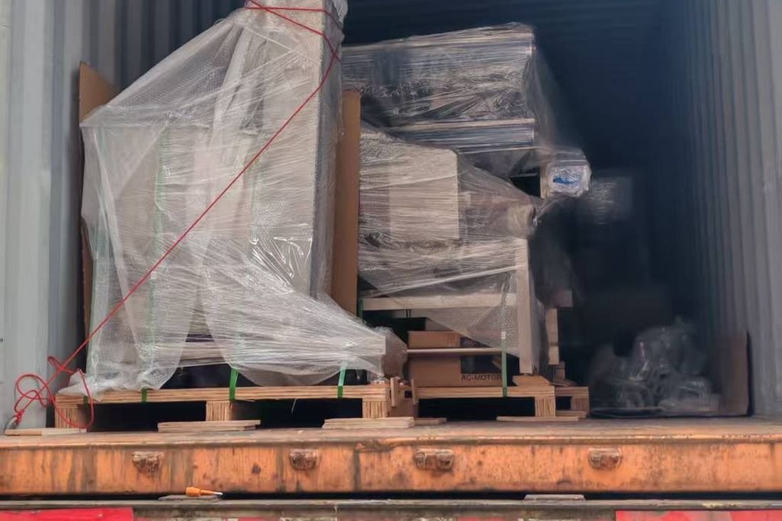 Oral-pouch line container-shipment photo