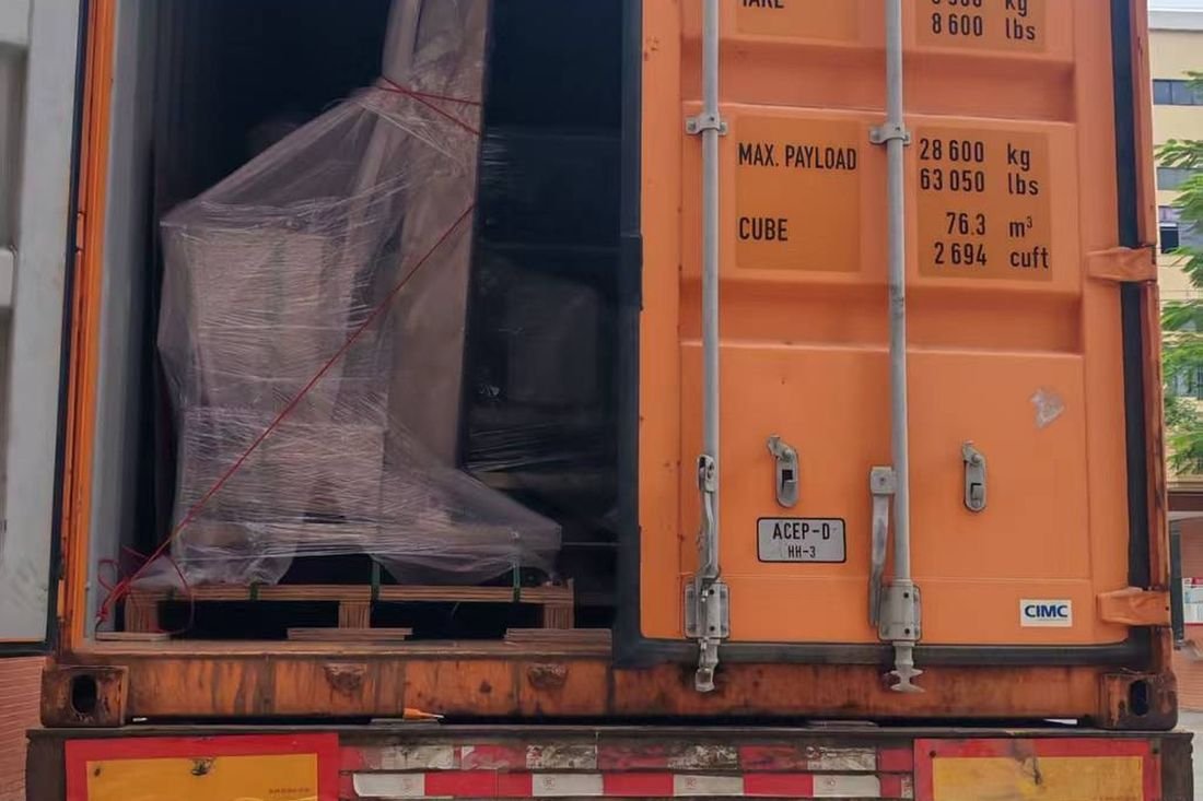 Oral-pouch line container-shipment photo