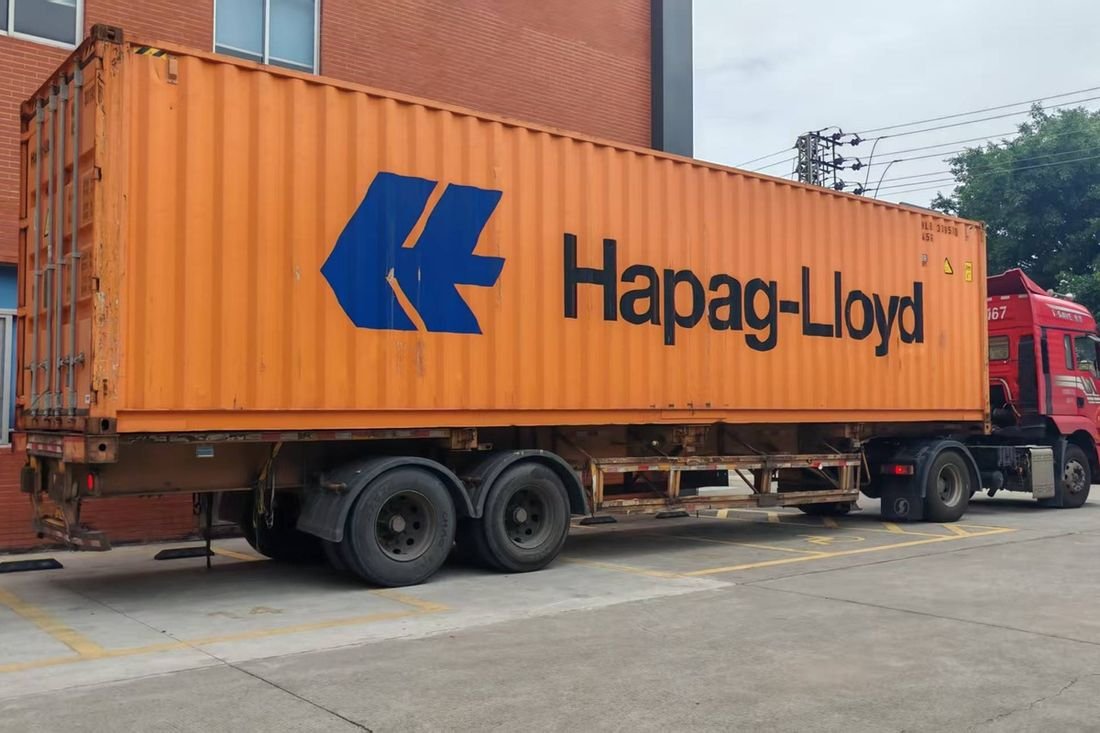 Oral-pouch line container-shipment photo