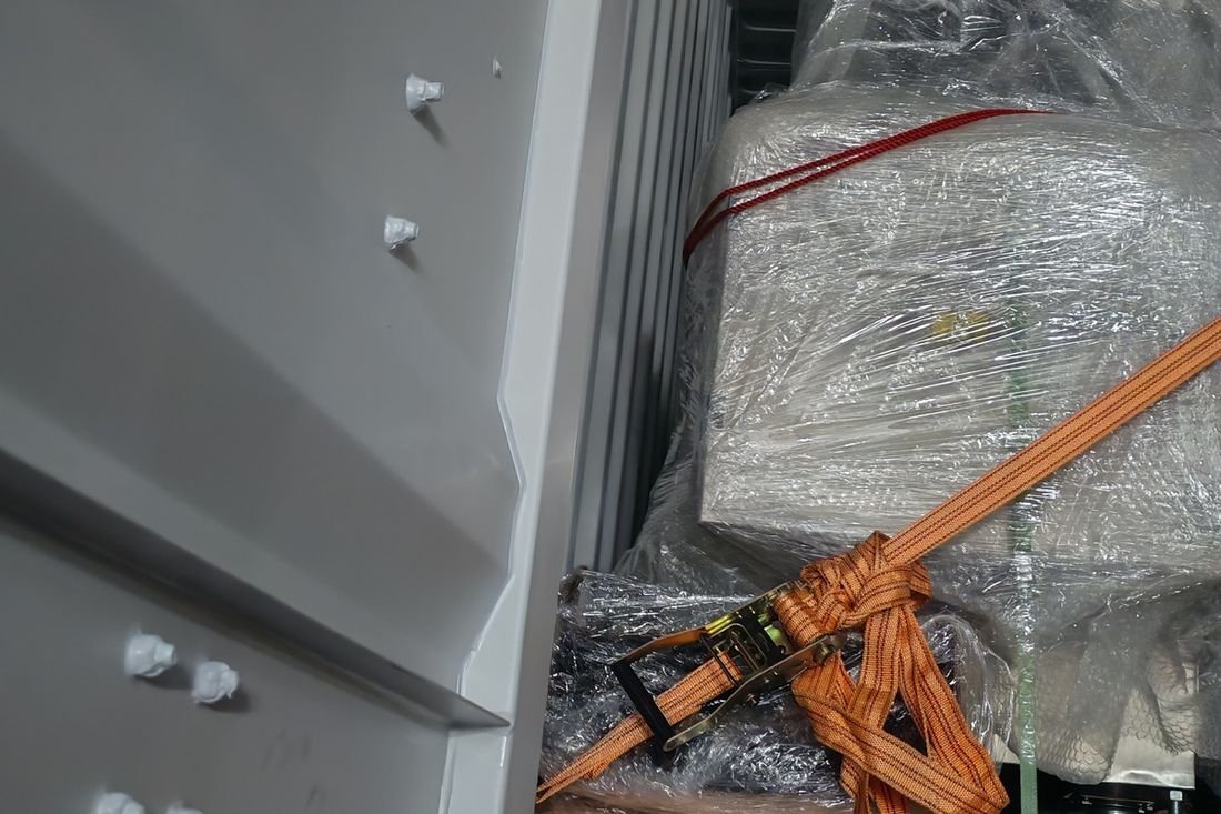 Oral-pouch line container-shipment photo