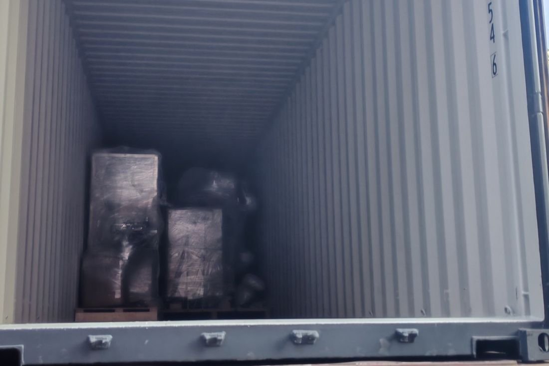 Oral-pouch line container-shipment photo