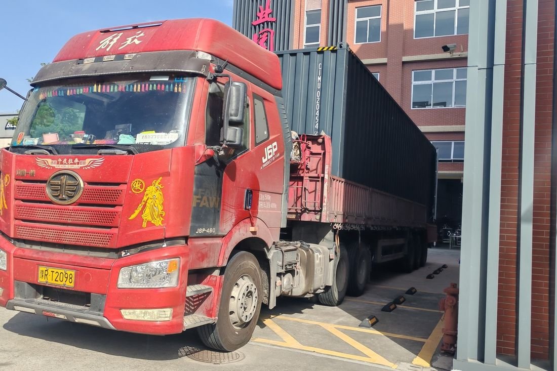 Oral-pouch line container-shipment photo
