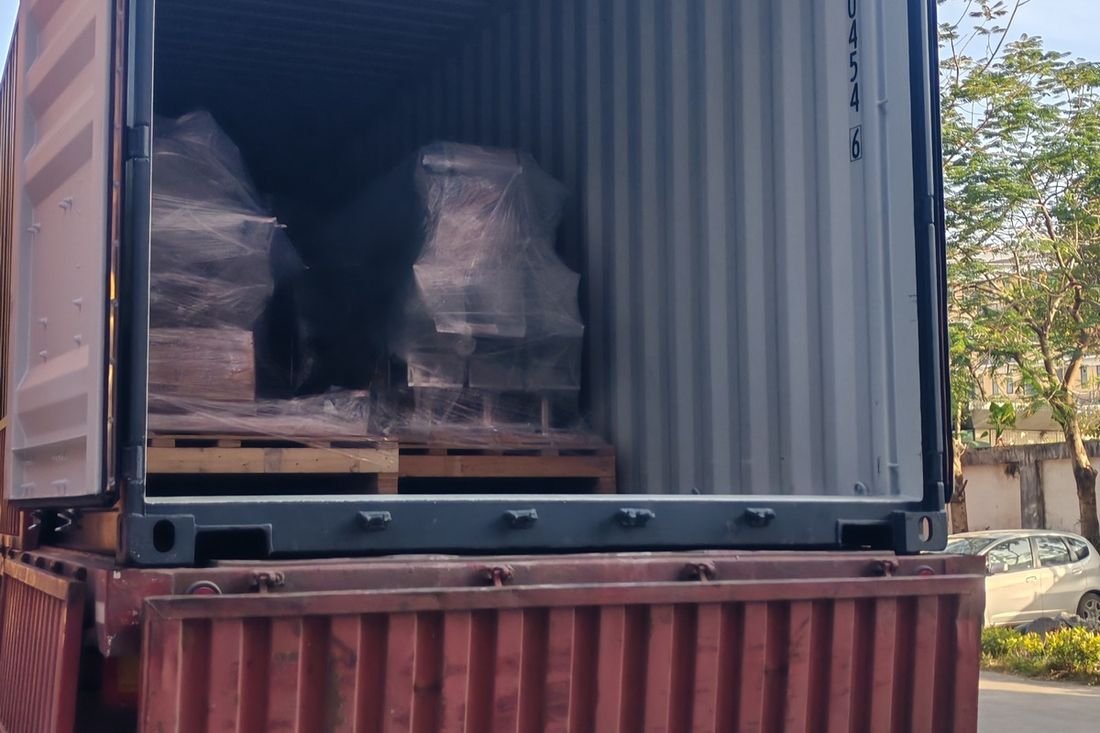 Oral-pouch line container-shipment photo
