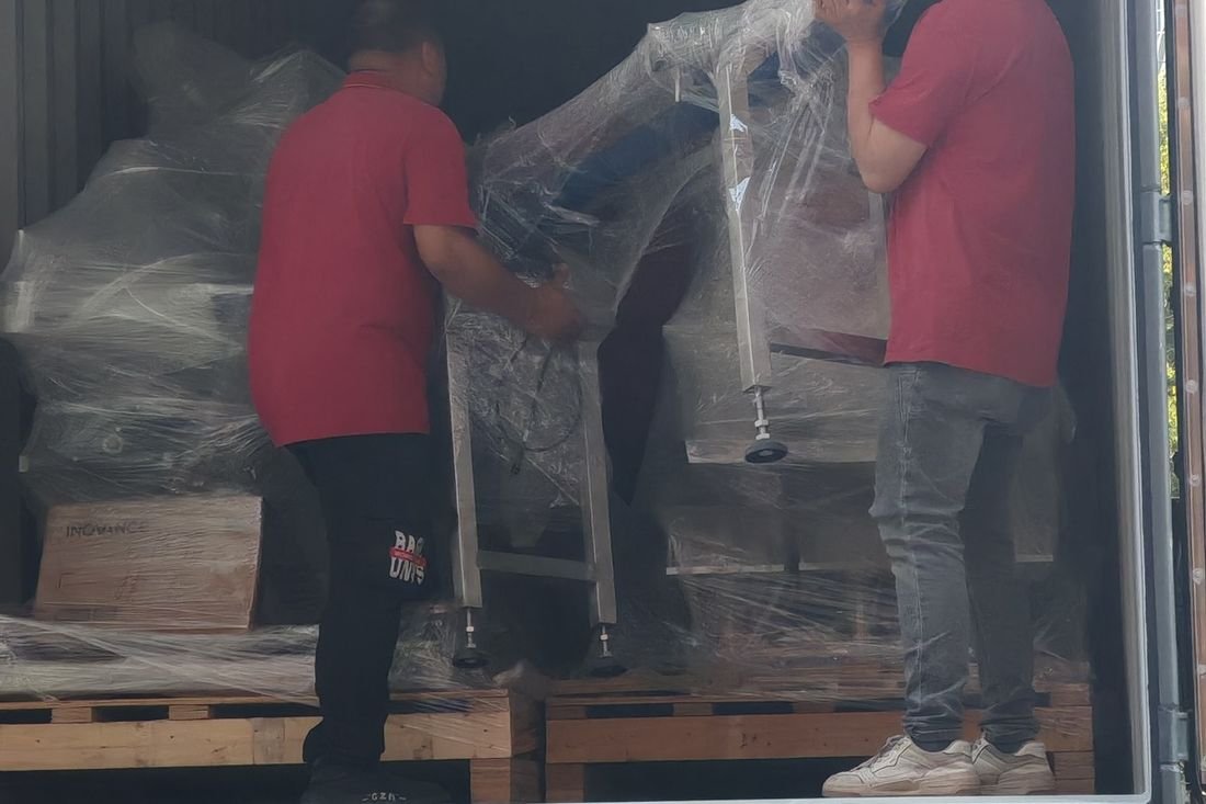 Oral-pouch line container-shipment photo