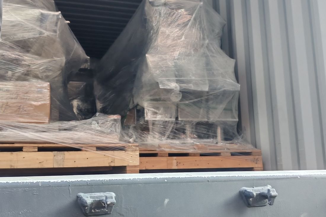 Oral-pouch line container-shipment photo