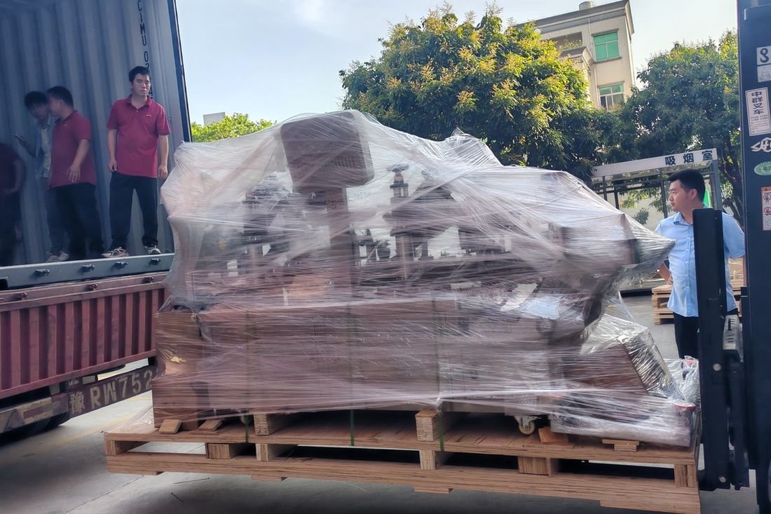 Oral-pouch line container-shipment photo