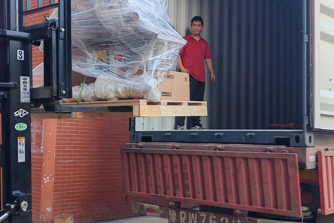 Oral-pouch line container-shipment photo