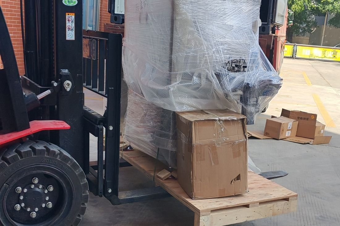 Oral-pouch line container-shipment photo