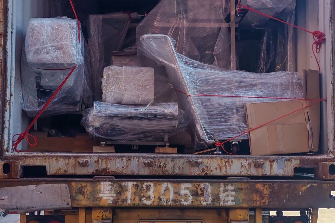Oral-pouch line container-shipment photo