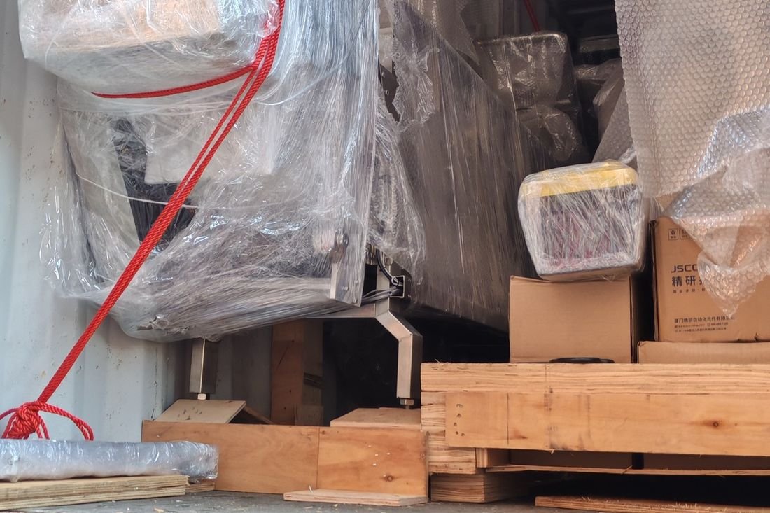 Oral-pouch line container-shipment photo