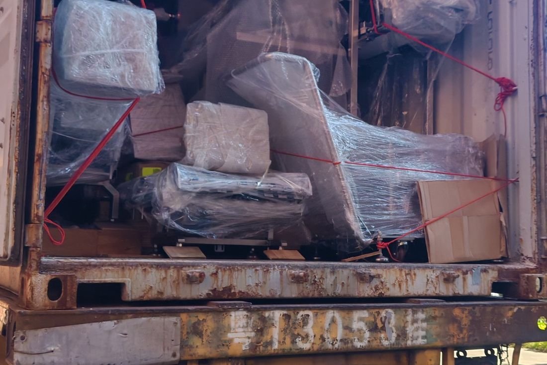 Oral-pouch line container-shipment photo