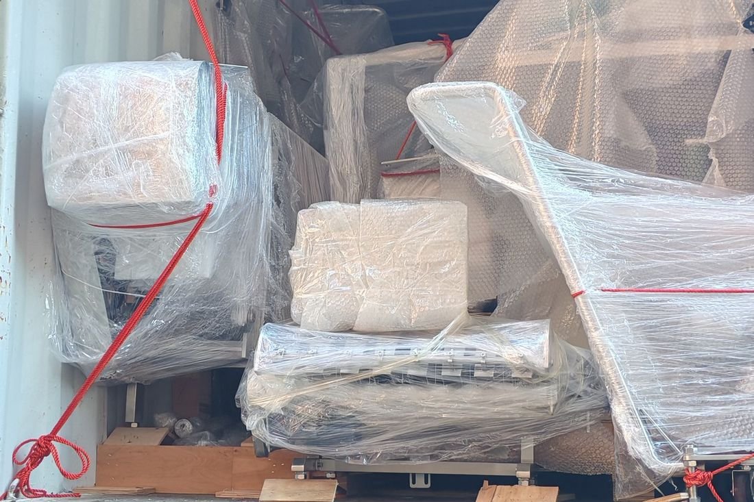 Oral-pouch line container-shipment photo