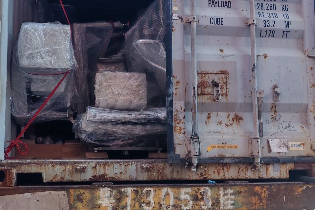 Oral-pouch line container-shipment photo