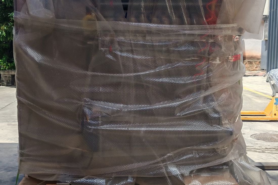 Oral-pouch line container-shipment photo