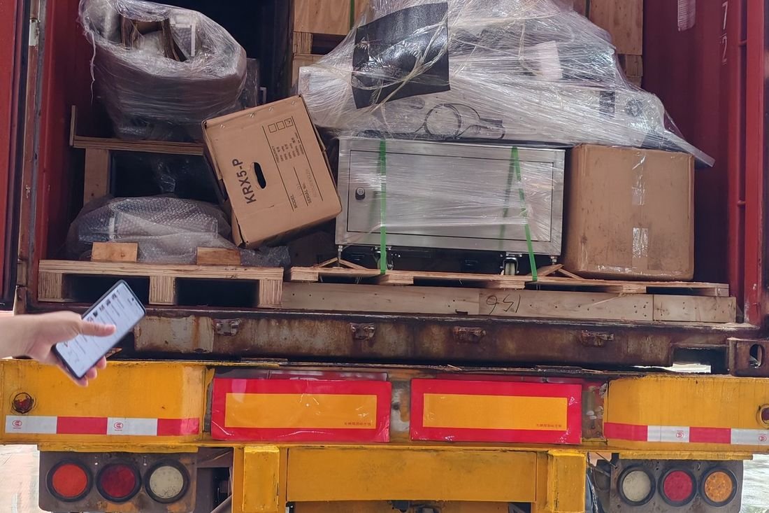 Oral-pouch line container-shipment photo