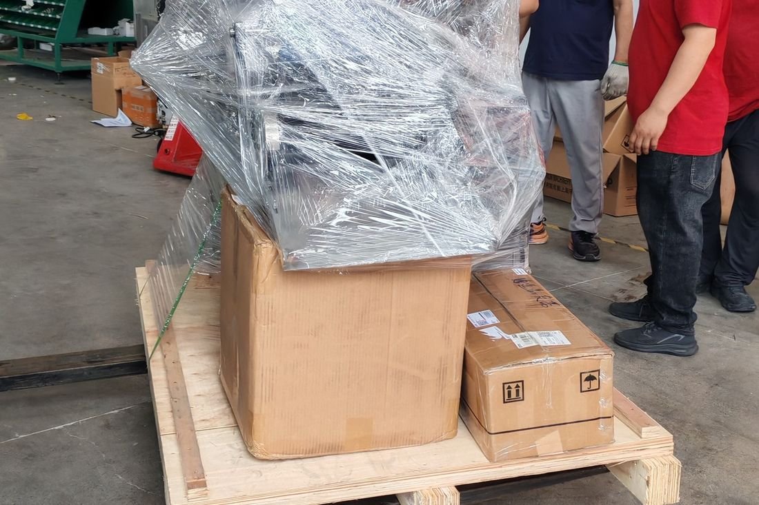 Oral-pouch line container-shipment photo