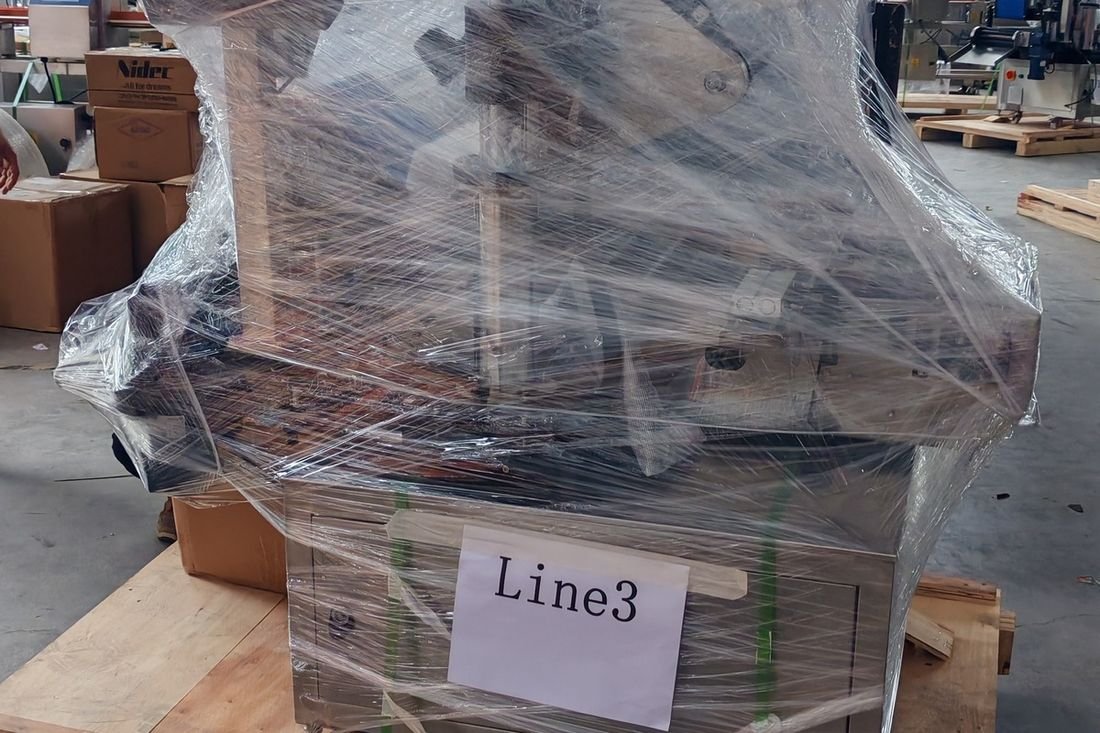Oral-pouch line container-shipment photo