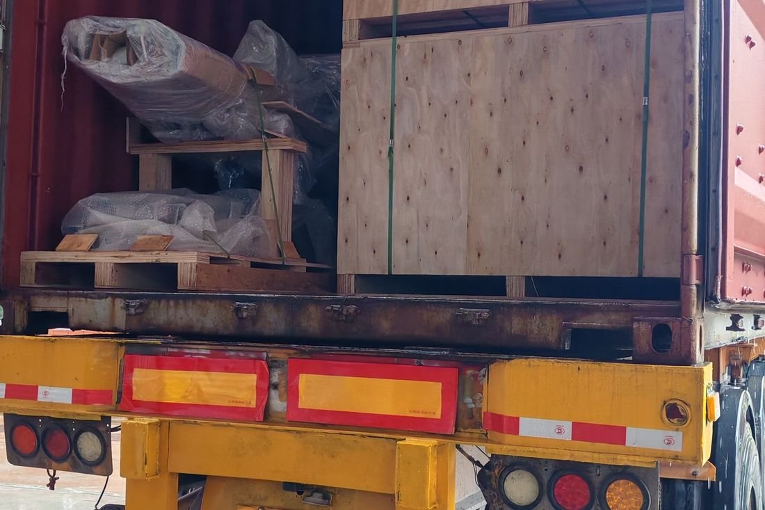 Oral-pouch line container-shipment photo