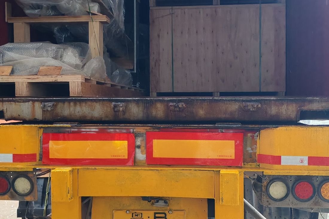 Oral-pouch line container-shipment photo