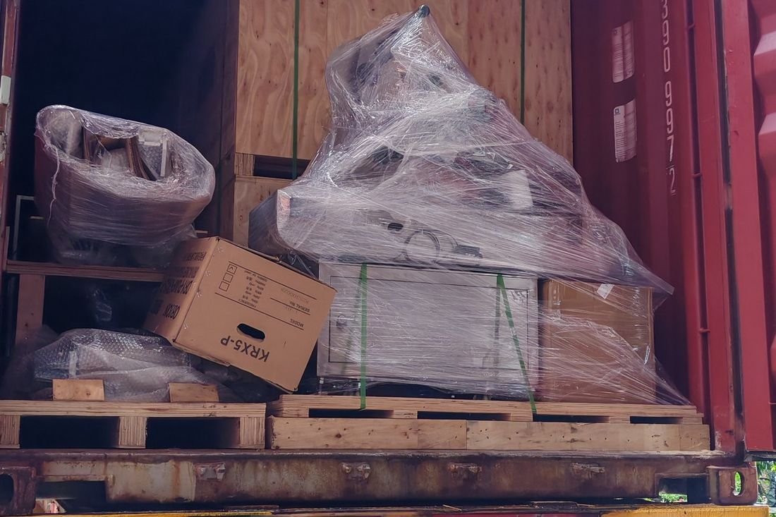 Oral-pouch line container-shipment photo