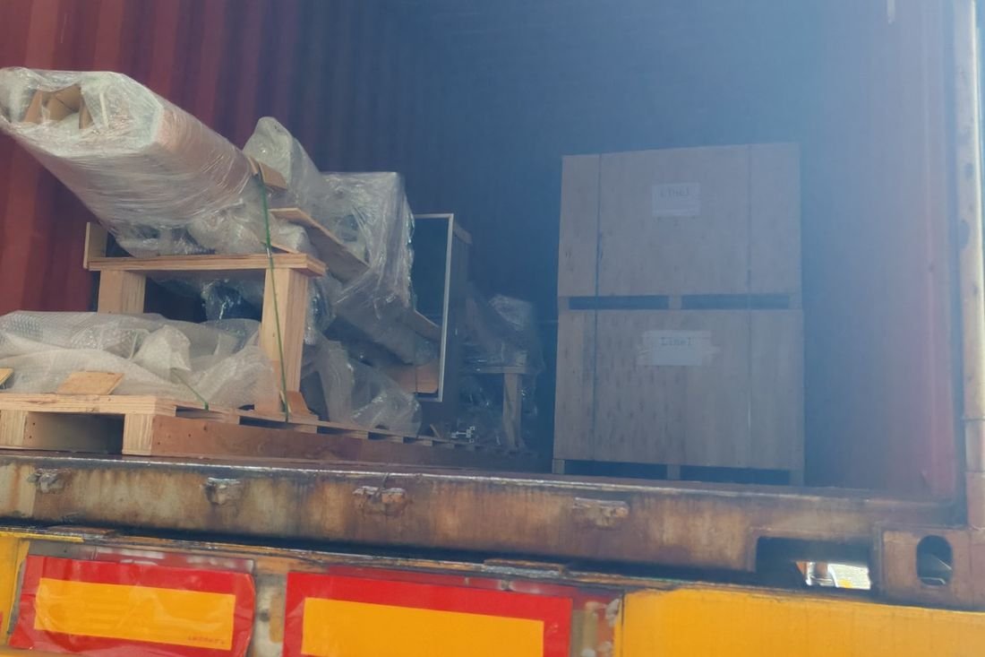Oral-pouch line container-shipment photo