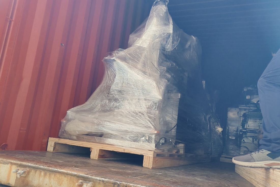 Oral-pouch line container-shipment photo