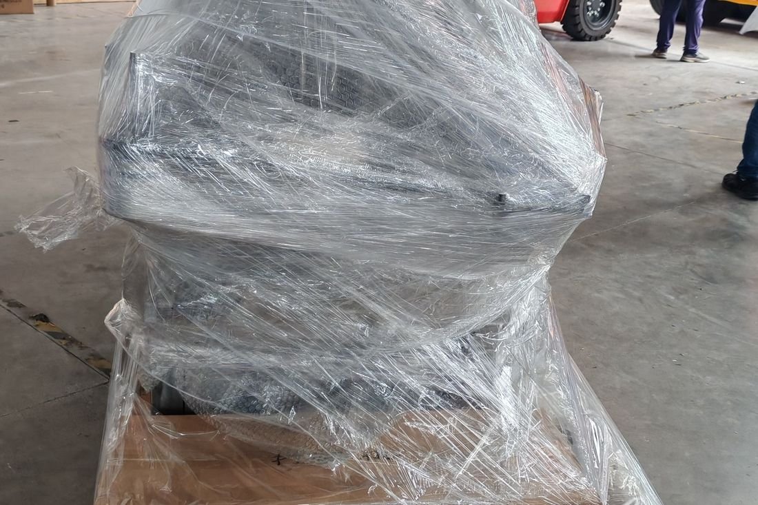 Oral-pouch line container-shipment photo