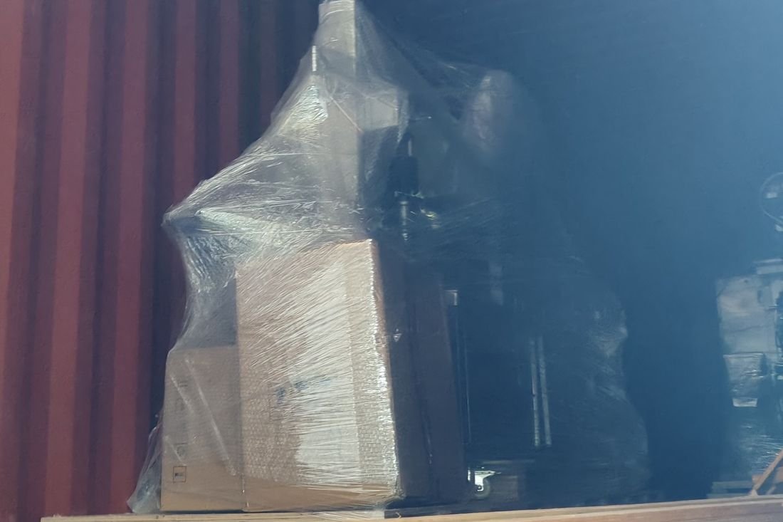 Oral-pouch line container-shipment photo