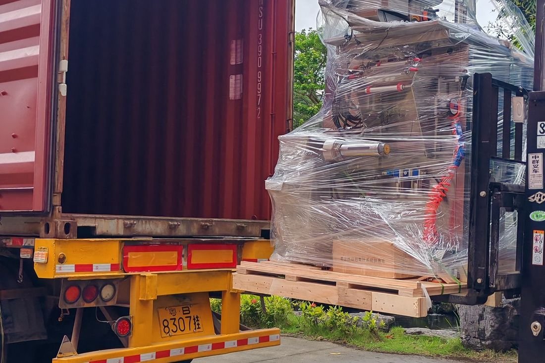 Oral-pouch line container-shipment photo