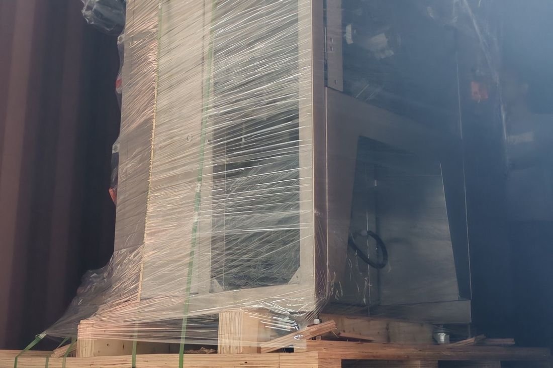 Oral-pouch line container-shipment photo