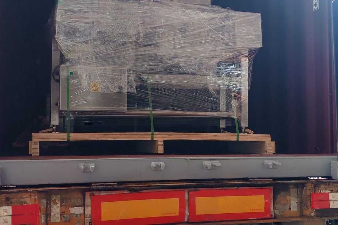 Oral-pouch line container-shipment photo