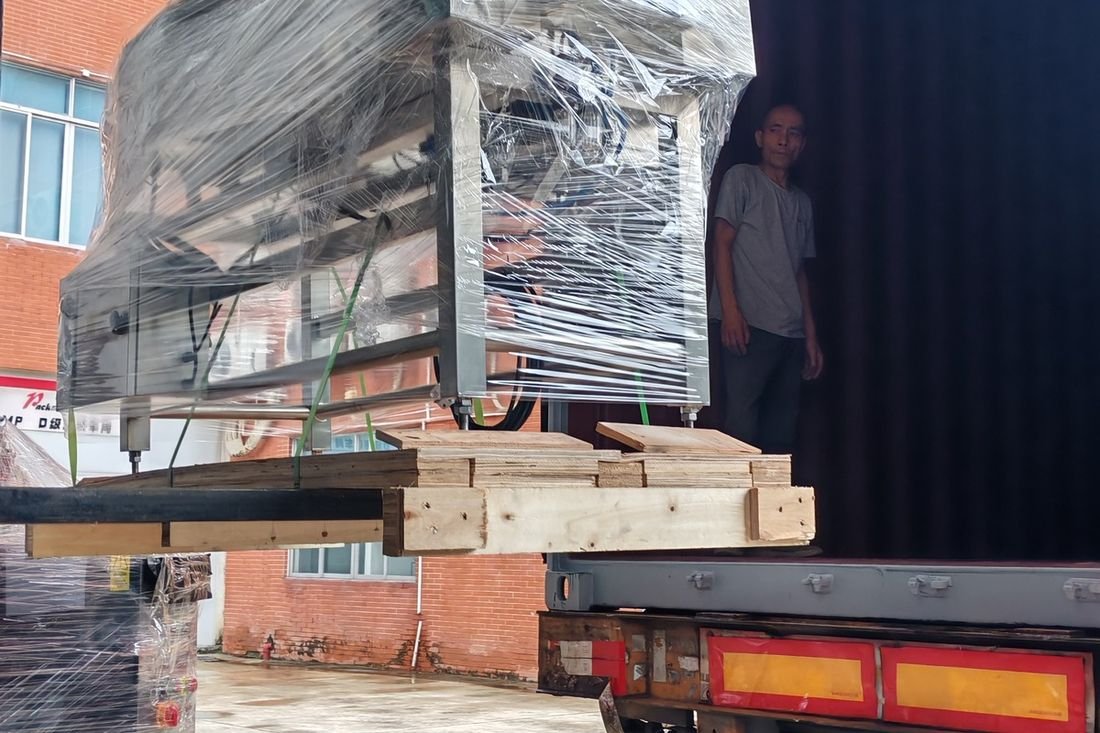 Oral-pouch line container-shipment photo