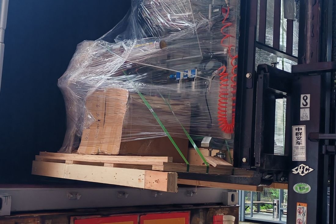 Oral-pouch line container-shipment photo