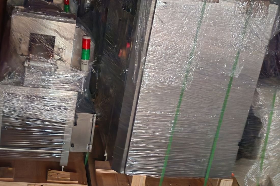 Oral-pouch line container-shipment photo