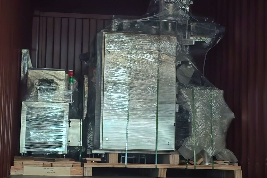 Oral-pouch line container-shipment photo