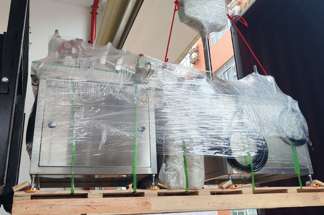 Oral-pouch line container-shipment photo