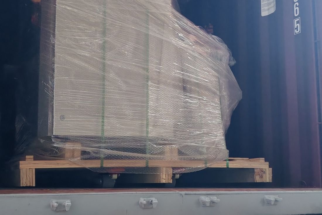 Oral-pouch line container-shipment photo