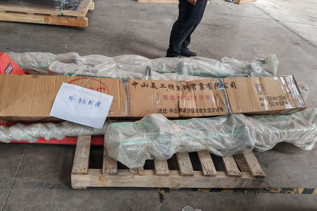 Oral-pouch line container-shipment photo