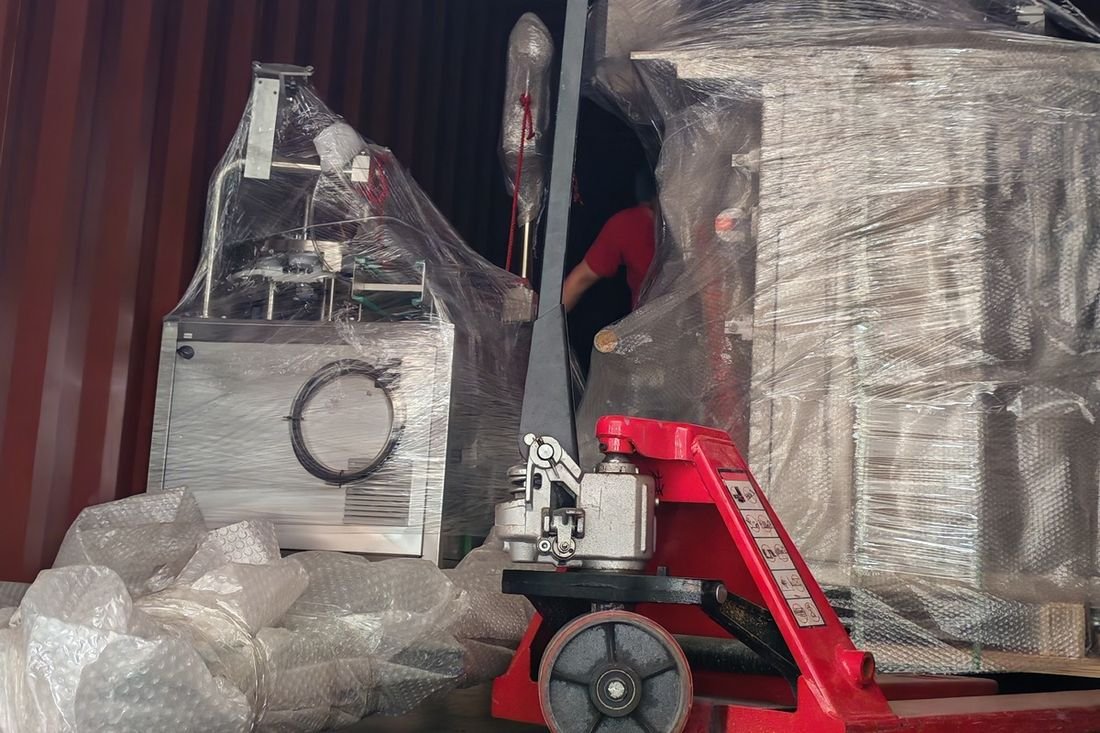 Oral-pouch line container-shipment photo