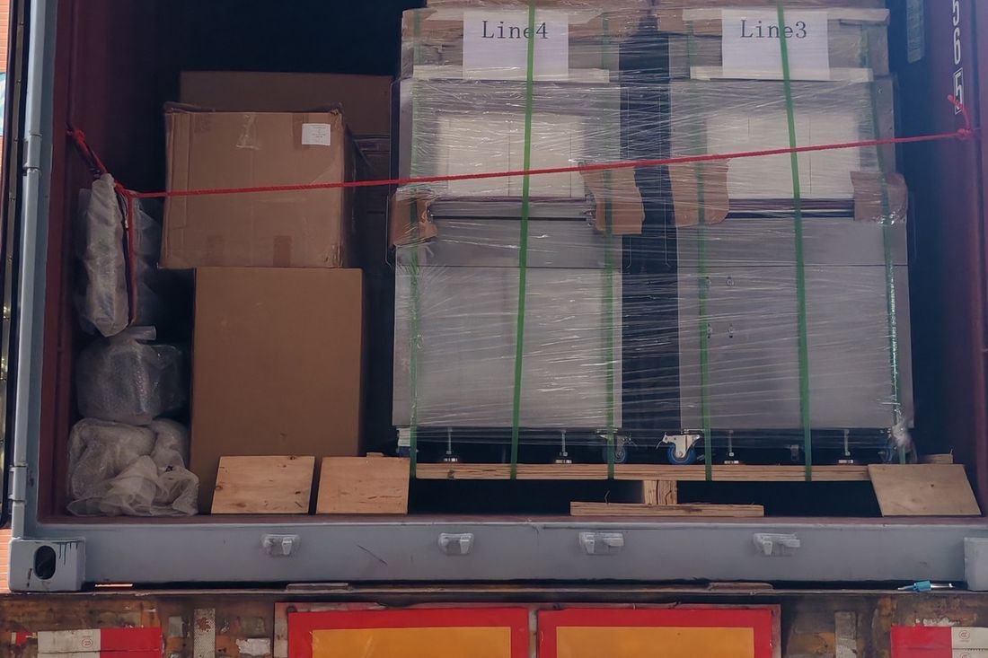 Oral-pouch line container-shipment photo
