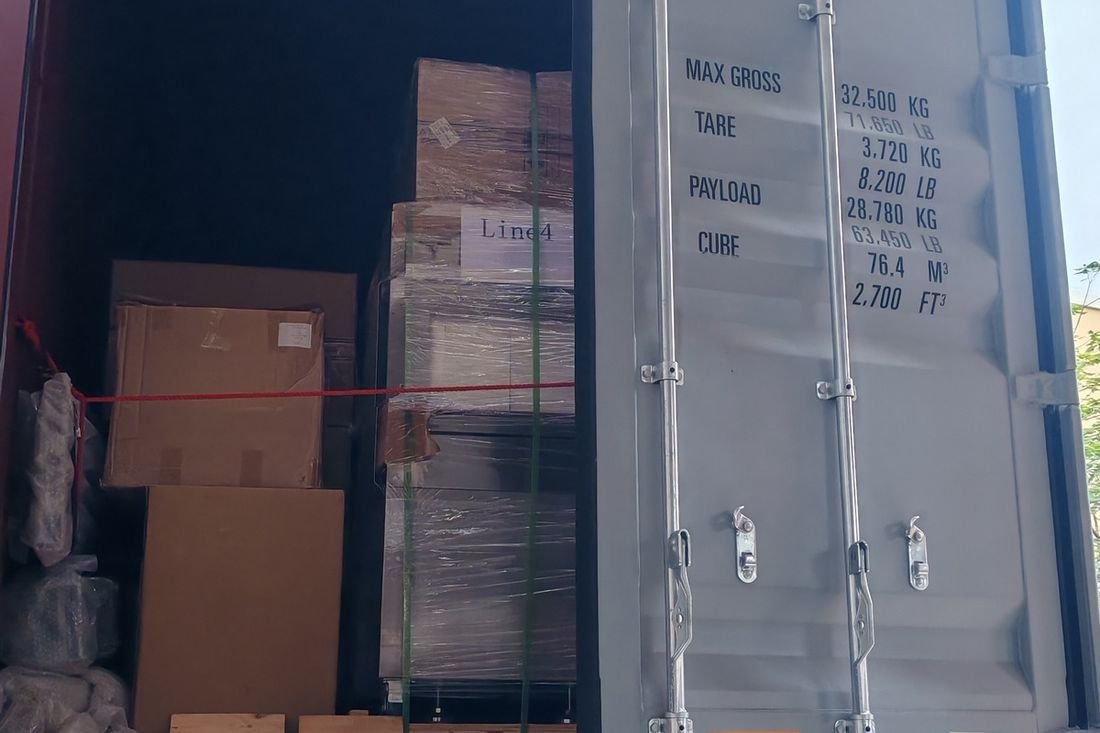 Oral-pouch line container-shipment photo