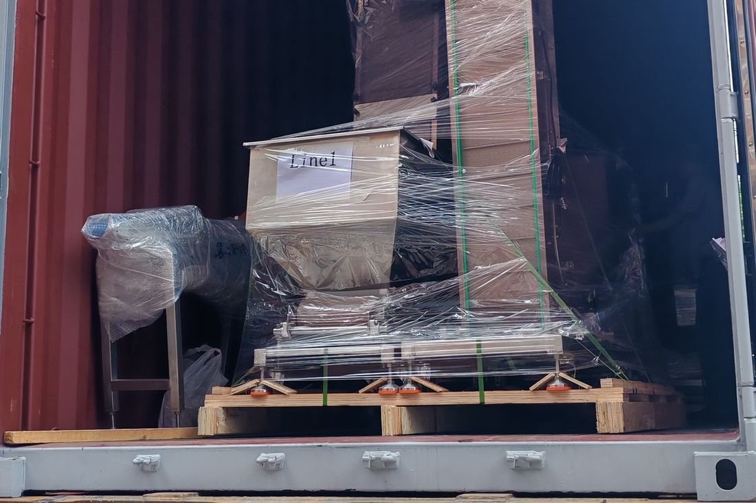 Oral-pouch line container-shipment photo