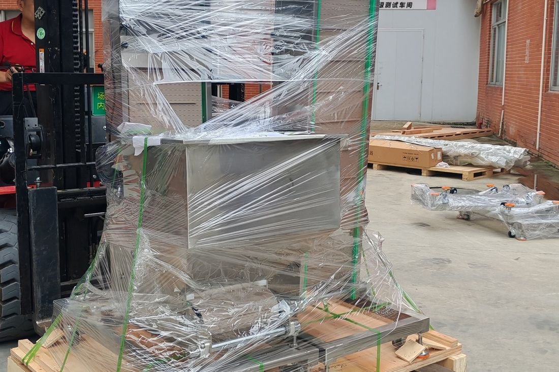Oral-pouch line container-shipment photo